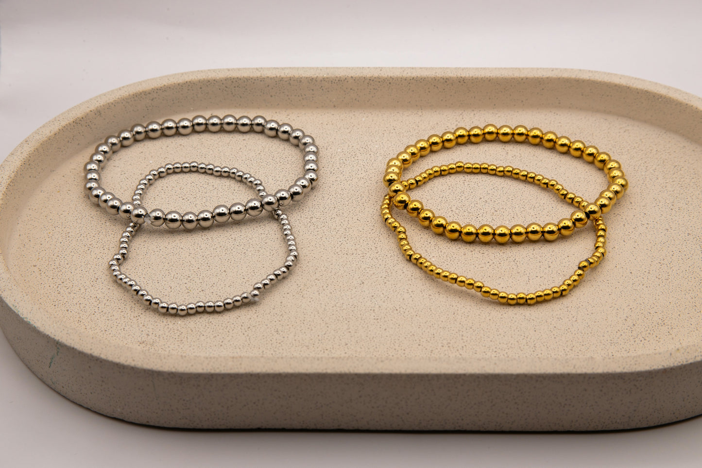 TWO BEADED STACKER BRACELETS