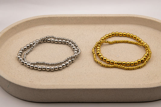 TWO BEADED STACKER BRACELETS